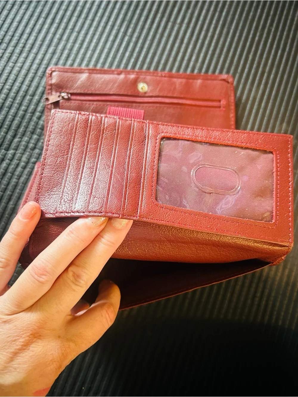 Wilson’s leather, maroon Leather trifold, wallet with Gold Accent